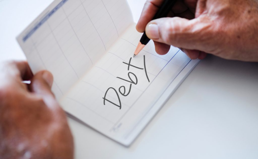 Image with text written as debt